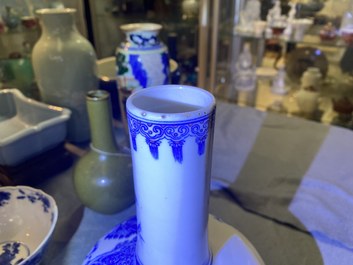A Chinese wucai rouleau vase and a blue, white and copper-red vase, 19/20th C.